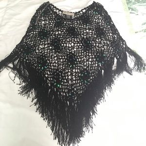 Black mesh poncho with tassels and sequins